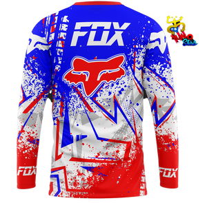 Fox racing t-shirt featuring a bold blue, red, and white design with the iconic Fox logo and splatter effects, perfect for motorsport enthusiasts in 2025, designed by Taino Shirts.5.9sFast