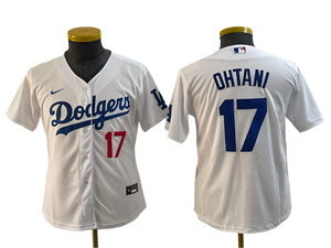 A white Los Angeles Dodgers baseball jersey with blue and red details, featuring the number 17 and the name 'OHTANI' on the back.