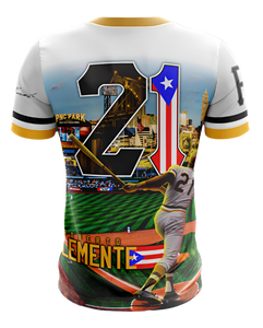 A kids' baseball t-shirt featuring an image of Roberto Clemente with the text 'The Great One' and a bat graphic.