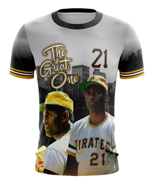 A t-shirt featuring a graphic design with the text 'The Great One 21', depicting a baseball player in a Pirates uniform, in reference to Roberto Clemente.
