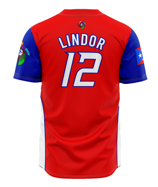 A striking white Puerto Rico baseball jersey with bold white and blue "PUERTO RICO" text, flag-inspired sleeve stripes, and a colorful emblem, ideal for baseball enthusiasts.