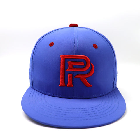 Vibrant blue Puerto Rico baseball cap with bold red "PR" embroidery, perfect for fans showing team pride and adding a stylish touch to any collection.