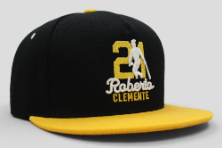 Black and yellow baseball cap featuring Roberto Clemente with number 21 and silhouette, perfect for Pittsburgh Pirates fans and baseball memorabilia collectors.