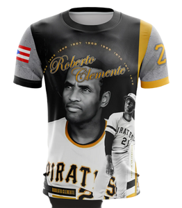 A kids' T-shirt featuring graphics of Roberto Clemente in a baseball uniform and the text 'Roberto Clemente'. The shirt is primarily black with yellow and gray accents.