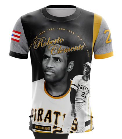 A kids' T-shirt featuring graphics of Roberto Clemente in a baseball uniform and the text 'Roberto Clemente'. The shirt is primarily black with yellow and gray accents.