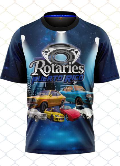 A short-sleeved blue t-shirt featuring a graphic print with the text 'Rotaries Puerto Rico' and images of colorful cars against a cosmic space background.