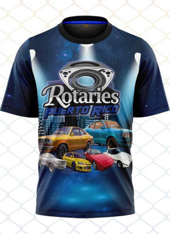 A short-sleeved blue t-shirt featuring a graphic print with the text 'Rotaries Puerto Rico' and images of colorful cars against a cosmic space background.