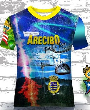 A colorful t-shirt celebrating Arecibo, Puerto Rico, with front and back designs. The front features "ARECIBO Puerto Rico" with a vibrant depiction of the Arecibo Observatory, a Puerto Rican flag emblem, and lush landscapes. The back showcases a historic building with the Puerto Rican flag and green hills, perfect for showcasing Arecibo pride and Puerto Rican heritage.