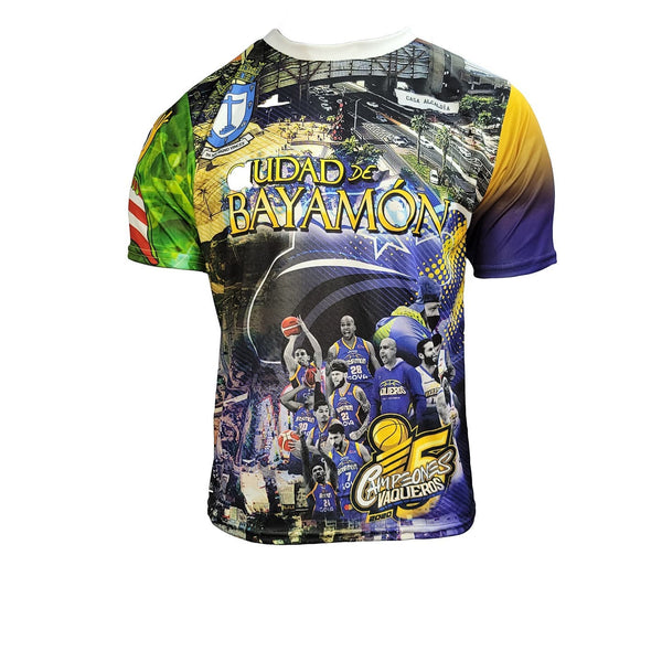 A multicolored t-shirt featuring various graphics including a basketball scene and text related to the Municipio de Bayamon.