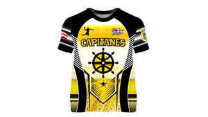 Front and back view of the 2025 Capitanes de Arecibo BSN basketball jersey, showcasing a yellow and black design with a ship wheel graphic, the team name 'Capitanes,' and the BSN logo. The back features 'Real Hasta la Muerte' text, 'Arecibo' lettering, a captain's hat emblem, and a Puerto Rican flag with the 'Gufao' mascot in the center.