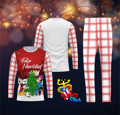A festive pajama set featuring a white long-sleeve top with Mickey and Minnie Mouse decorating a Christmas tree and "Feliz Navidad" text, red and white plaid sleeves and matching plaid pants, and the Taino Shirts logo with Puerto Rican flag elements, set against a starry background with lights.
