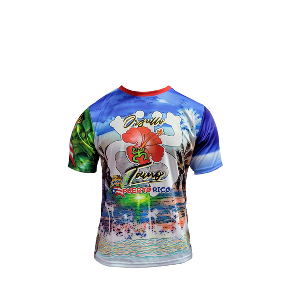 A colorful t-shirt celebrating "Orgullo Coquí Luquillo Puerto Rico" with a vibrant tropical design featuring a large red hibiscus flower, palm trees, a beach and ocean scene, Puerto Rican flag elements, and green accents, ideal for showing Puerto Rican pride and love for Luquillo's coastal vibes.