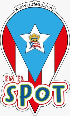 A vibrant logo featuring the Puerto Rican flag with blue, red, and white colors, a central white star, and a cartoon character holding a flag. The text "EN EL SPOT" is prominently displayed at the bottom in bold, colorful letters. The website "www.gufeo.com" is noted at the top.