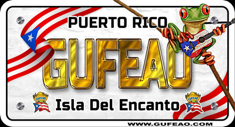 A stylized license plate with a background of the Puerto Rican flag's red and white stripes and blue triangle with a white star. The word "GUFEAO" is prominently displayed in large gold letters, with "PUERTO RICO" above it in black. Below, "Isla Del Encanto" is written in black, flanked by two "Gufeo" cartoon characters with flags. A green coqui frog playing a guitar with a Puerto Rican flag design sits on a stick, and the website "www.gufeo.com" is at the bottom.
