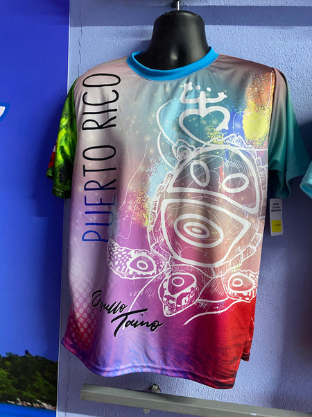 Vibrant left and right views of a Puerto Rican shirt featuring a stylized turtle design, "Puerto Rico" text, and the Gufeao mascot with the Puerto Rican flag, showcasing cultural artistry and pride.