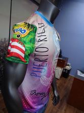 Vibrant left and right views of a Puerto Rican shirt featuring a stylized turtle design, "Puerto Rico" text, and the Gufeao mascot with the Puerto Rican flag, showcasing cultural artistry and pride.