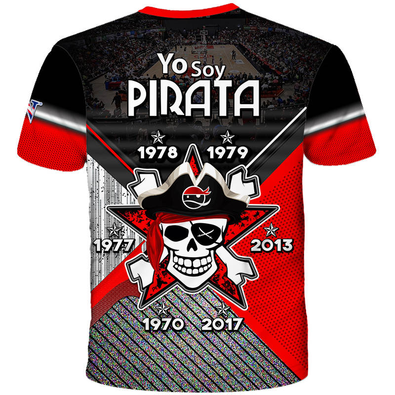 Front view of the 2025 Quebradillas Piratas BSN basketball jersey, displaying a black and red design with a pirate mascot holding a basketball under a hoop, the team name 'Quebradillas Piratas Est. 1926,' and the BSN logo. Features the 'Gufao' mascot emblem with a Puerto Rican flag in the corner.
