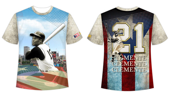 A stylish t-shirt featuring front and back designs honoring Roberto Clemente, a legendary baseball player. The front showcases Clemente in his batting pose against a stadium backdrop with a Puerto Rican flag, while the back displays his number 21 and name in bold, set against a distressed flag design.