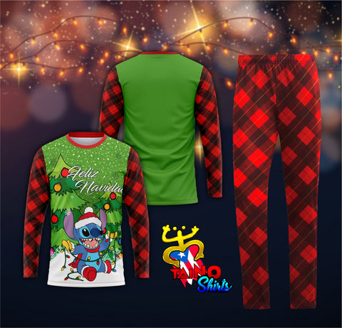 A two-piece pajama set featuring a long-sleeve top with a Christmas-themed design and red and black plaid pants.