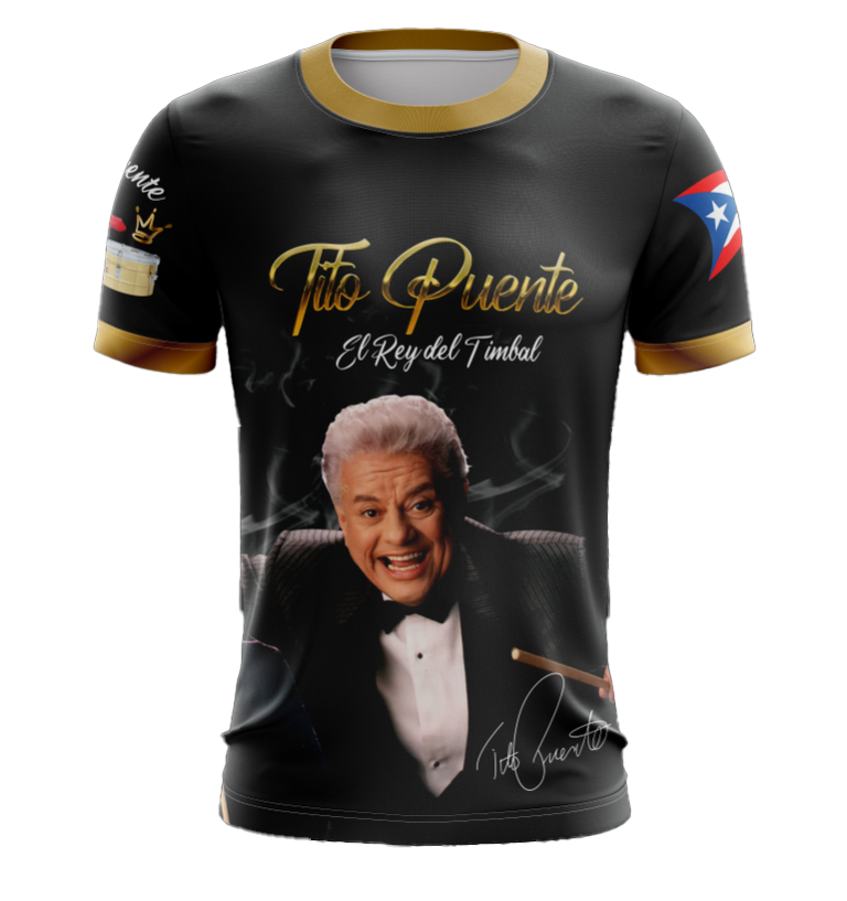 A black T-shirt featuring an image of Tito Puente with text 'Tito Puente El Rey del Timbal' and the flag of Puerto Rico.