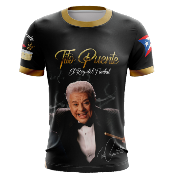 A black T-shirt featuring an image of Tito Puente with text 'Tito Puente El Rey del Timbal' and the flag of Puerto Rico.