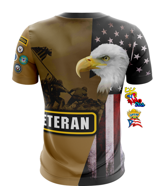 A patriotic t-shirt honoring United States Armed Forces veterans, featuring the American flag, eagle emblem, soldier silhouettes, and combat patches. Designed by Taino Shirts with a Puerto Rican flag accent, ideal for military supporters and collectors